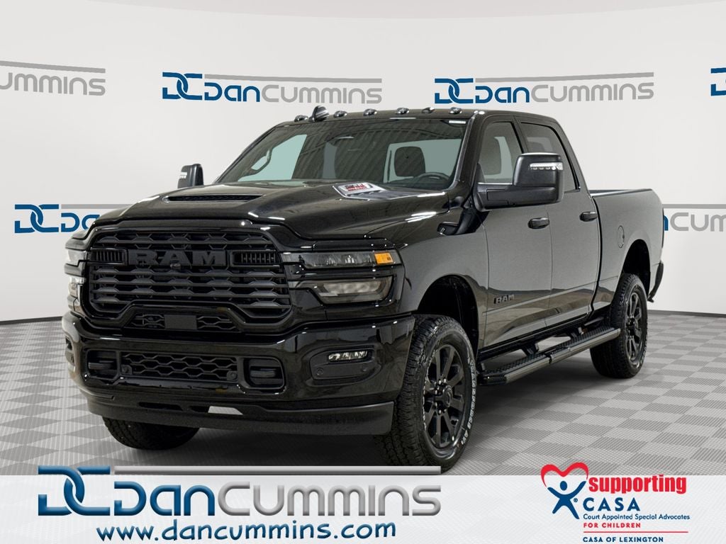 2026 RAM 2500 Big Horn in Diamond Black Crystal Pearl-Coat Exterior Paint — front three-quarter view