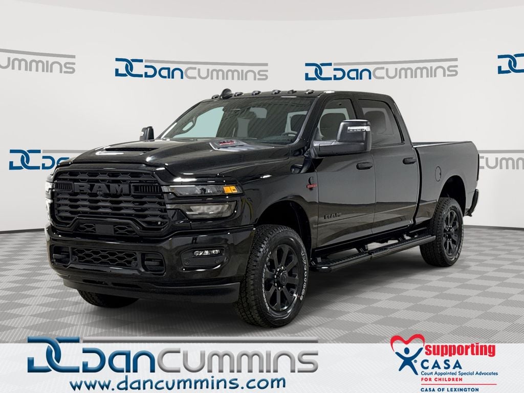 2026 RAM 2500 Big Horn in Diamond Black Crystal Pearl-Coat Exterior Paint — front three-quarter view
