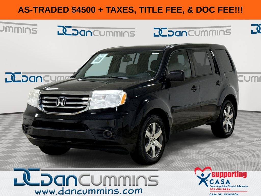 2013 Honda Pilot LX in Black — front three-quarter view