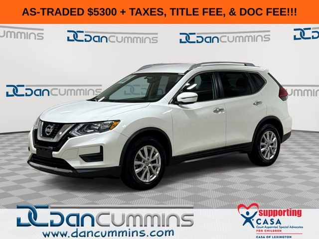 2017 Nissan Rogue SV in Glacier White — front three-quarter view