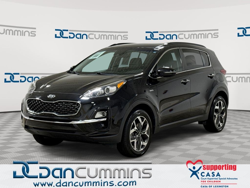 2022 Kia Sportage EX in Black Cherry Pearl — front three-quarter view