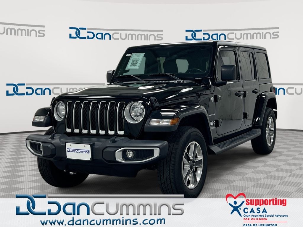 2019 Jeep Wrangler Unlimited Sahara in Black Clearcoat — front three-quarter view
