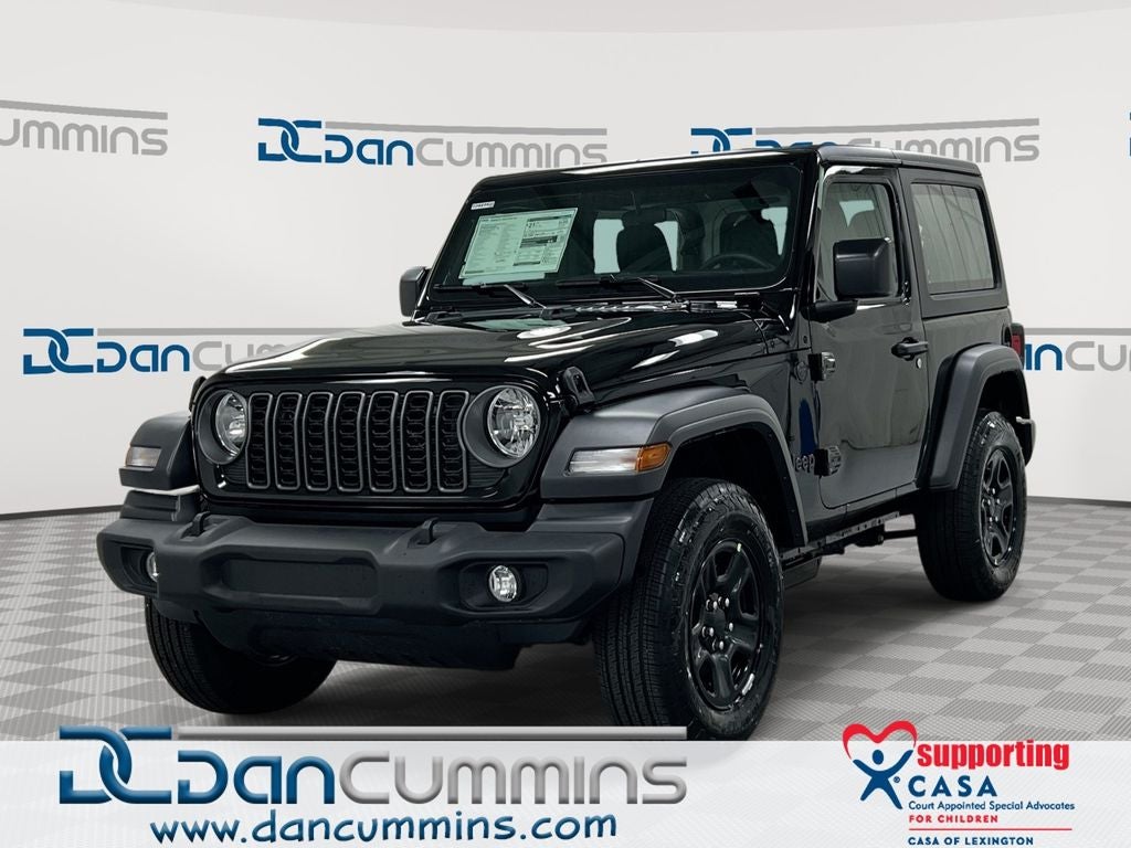2026 Jeep Wrangler Sport in Black Clear-Coat Exterior Paint — front three-quarter view
