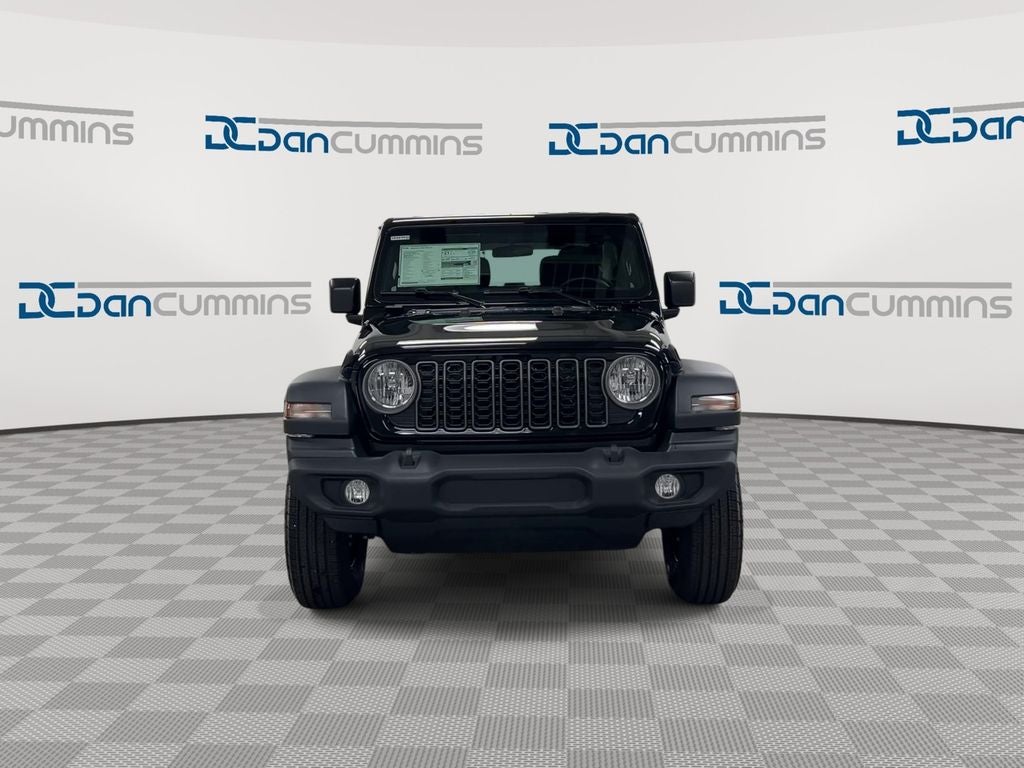 2026 Jeep Wrangler — rear three-quarter view