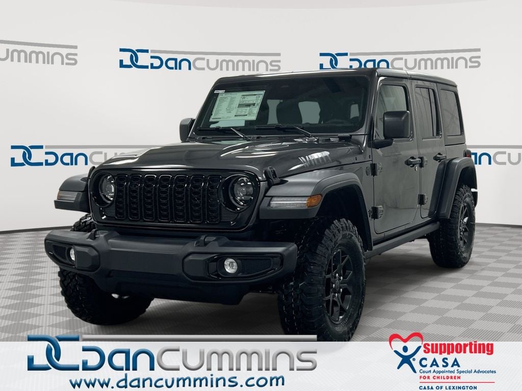 2026 Jeep Wrangler Willys in Granite Crystal Metallic Clear-Coat Exterior Paint — front three-quarter view