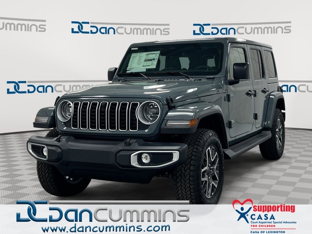 2026 Jeep Wrangler Sahara in Anvil Clear-Coat Exterior Paint — front three-quarter view
