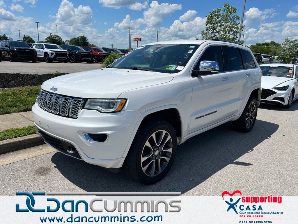 2017 Jeep Grand Cherokee Overland in Ivory 3-Coat — front three-quarter view