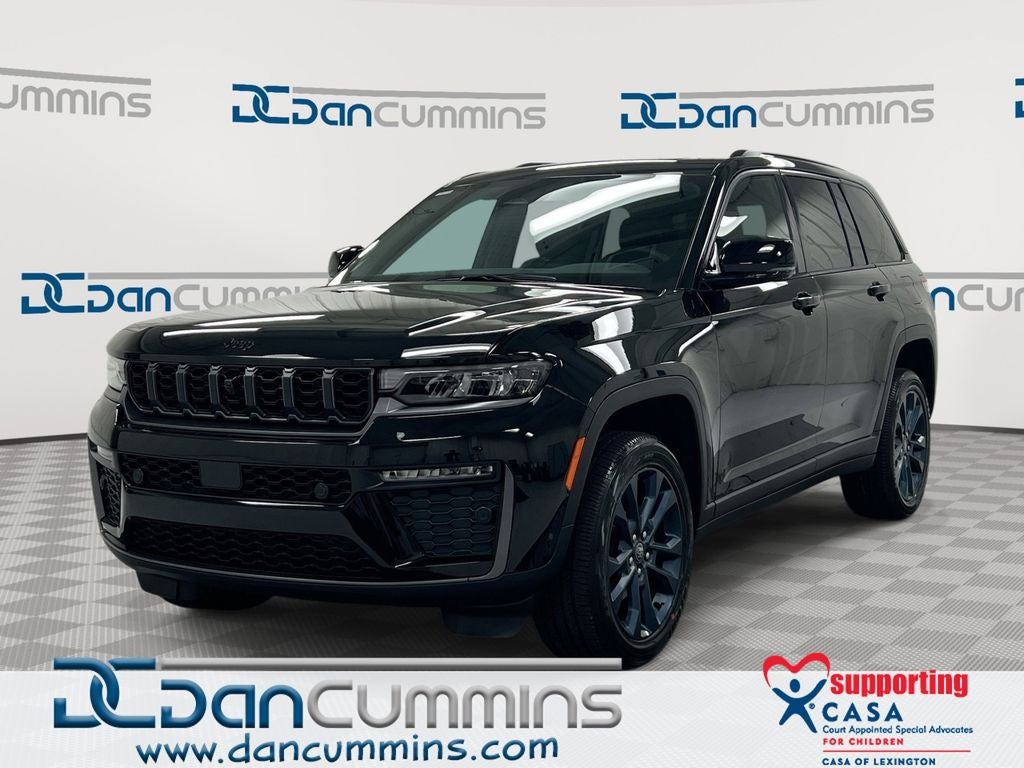 2026 Jeep Grand Cherokee Limited in Diamond Black Crystal Pearl-Coat Exterior Paint — front three-quarter view