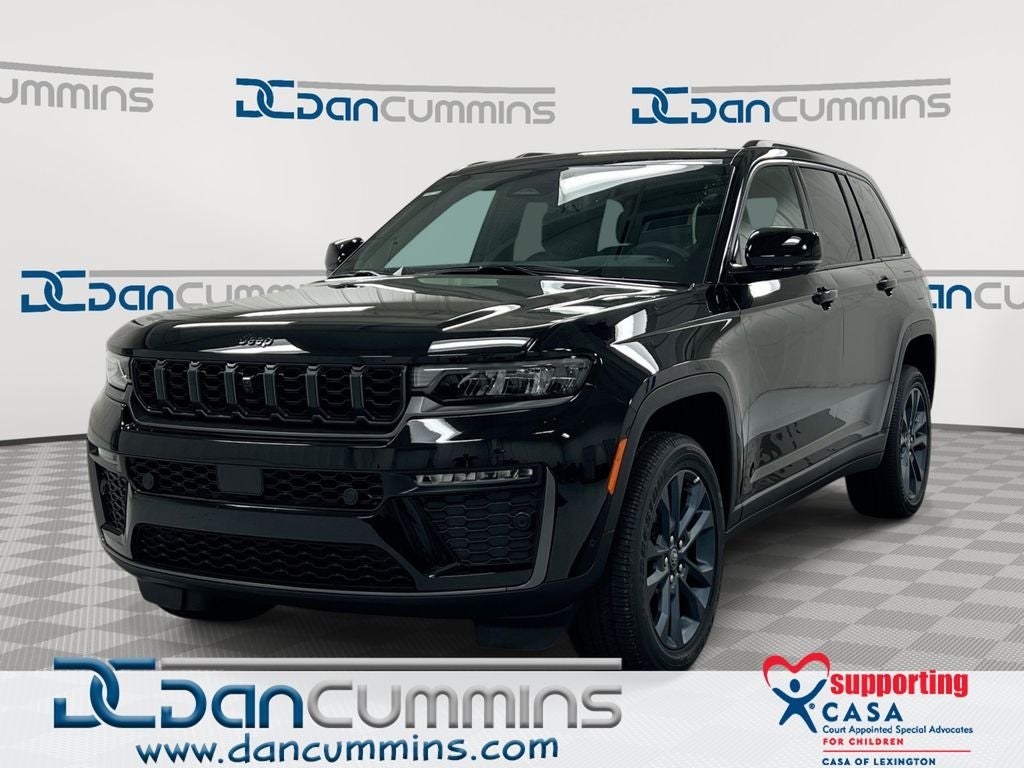 2026 Jeep Grand Cherokee Limited in Diamond Black Crystal Pearl-Coat Exterior Paint — front three-quarter view