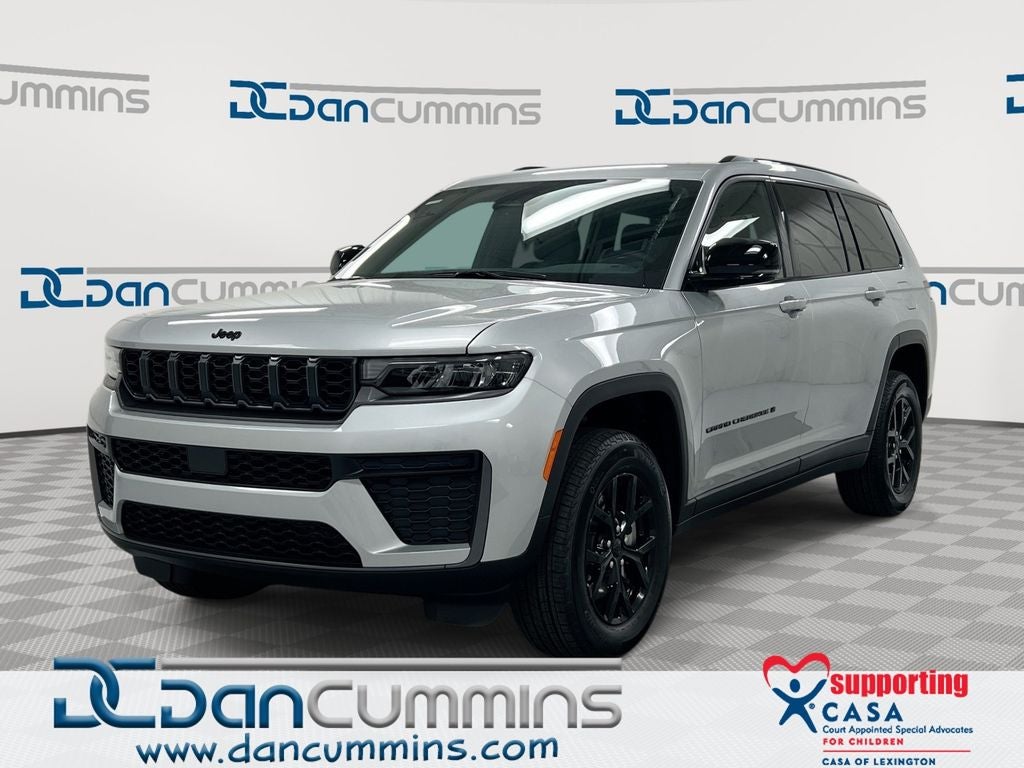 2026 Jeep Grand Cherokee L Laredo in Silver Zynith Exterior Paint — front three-quarter view