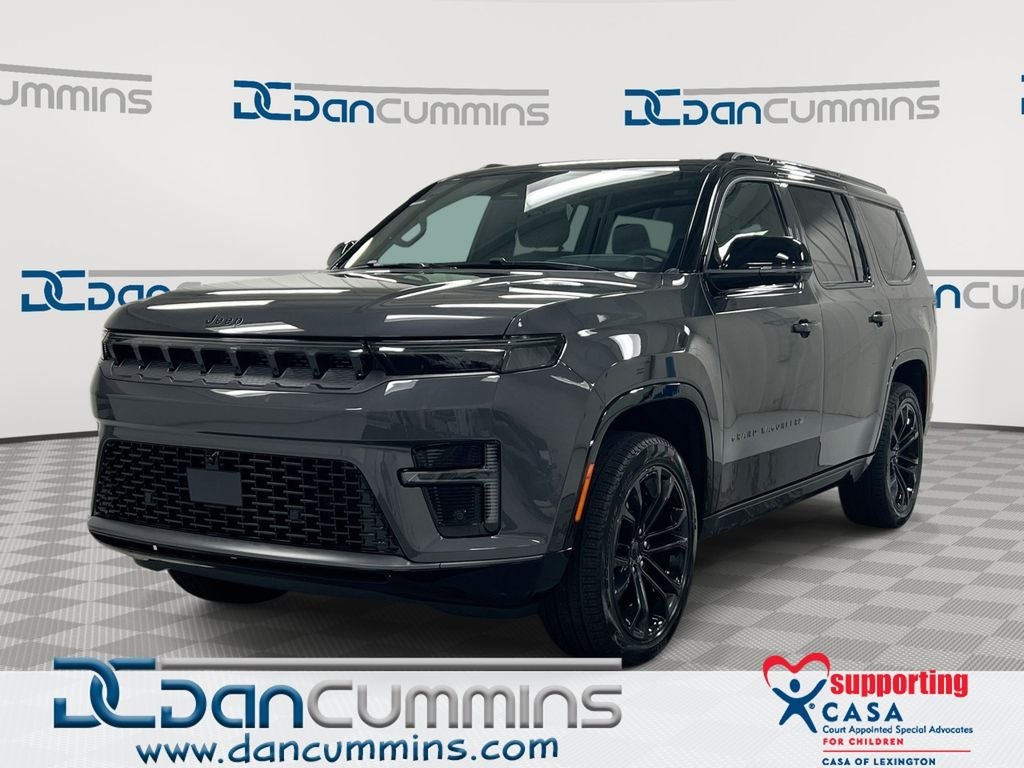 2026 Jeep Grand Wagoneer Summit Obsidian in Baltic-Gray Metallic Clear-Coat Exterior Paint — front three-quarter view