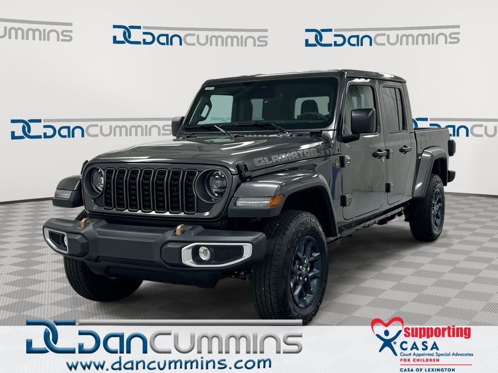 2026 Jeep Gladiator 85th Anniversary Edition in Granite Crystal Metallic Clear-Coat Exterior Paint — front three-quarter view