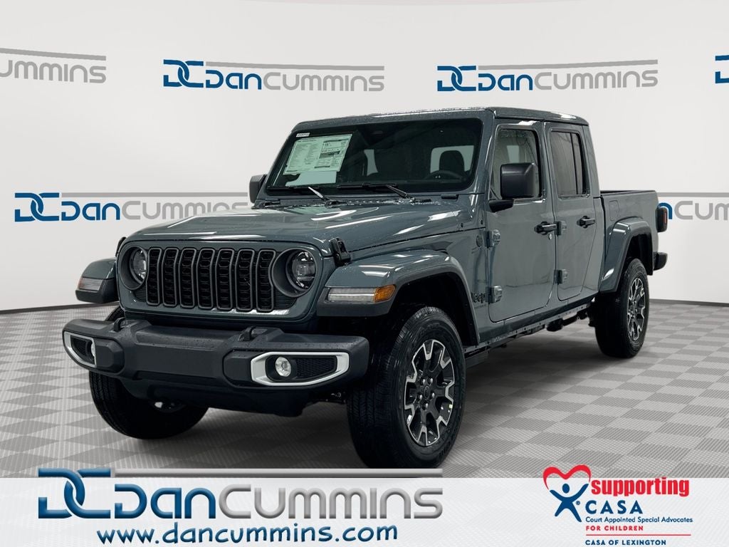 2026 Jeep Gladiator Sahara in Anvil Clear-Coat Exterior Paint — front three-quarter view
