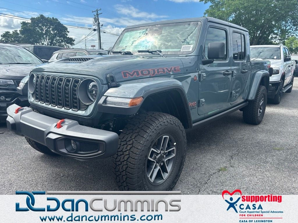 2026 Jeep Gladiator Mojave in Anvil Clear-Coat Exterior Paint — front three-quarter view