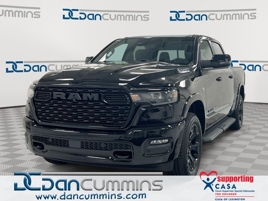 2026 RAM 1500 Big Horn/Lone Star in Diamond Black Crystal Pearl-Coat Exterior Paint — front three-quarter view