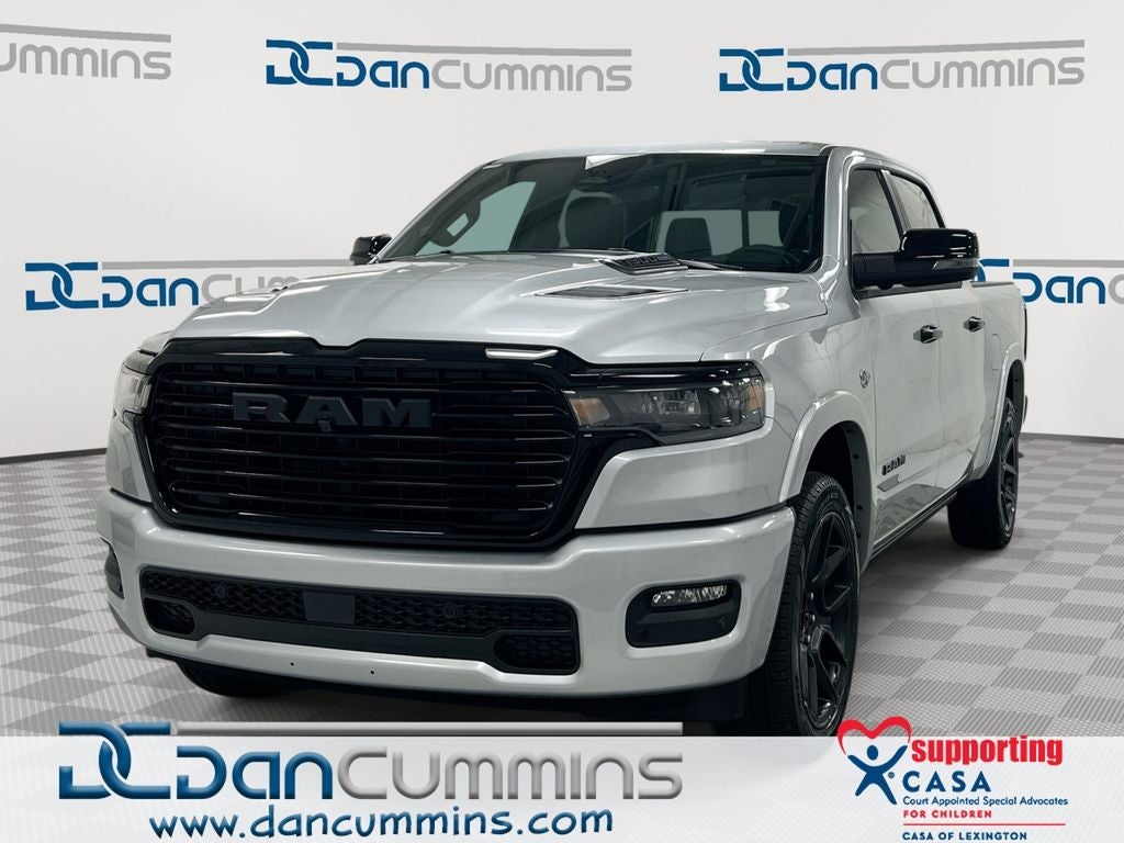 2026 RAM 1500 Laramie in Silver Zynith Exterior Paint — front three-quarter view