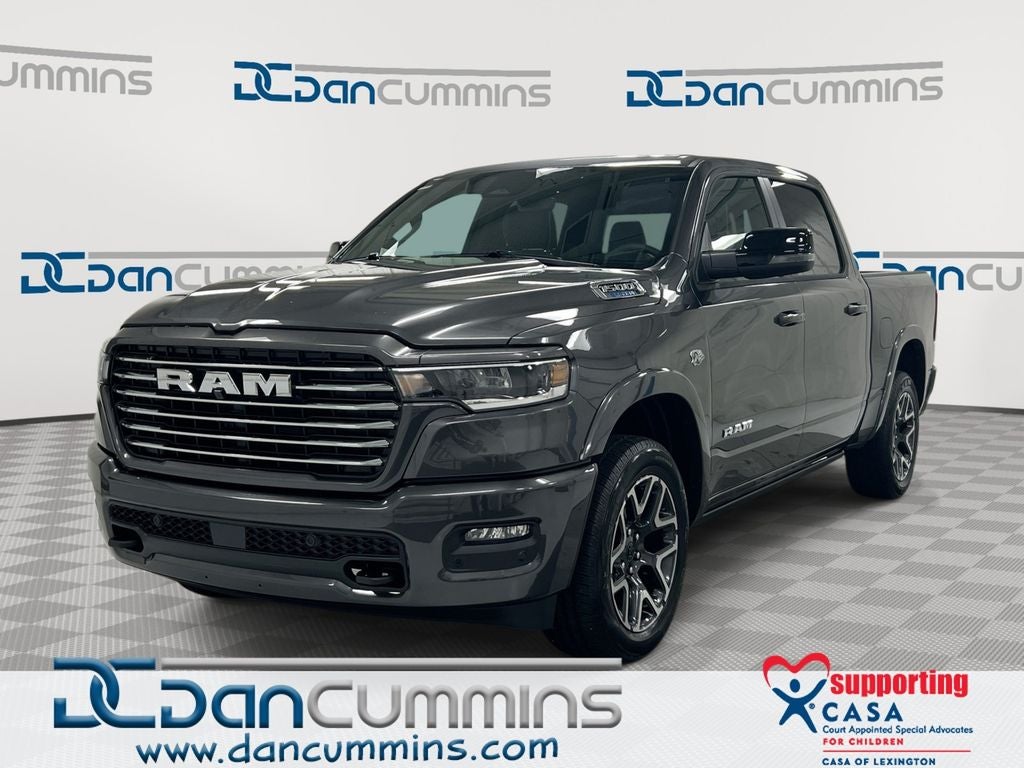2026 RAM 1500 Laramie in Granite Crystal Metallic Clear-Coat Exterior Paint — front three-quarter view