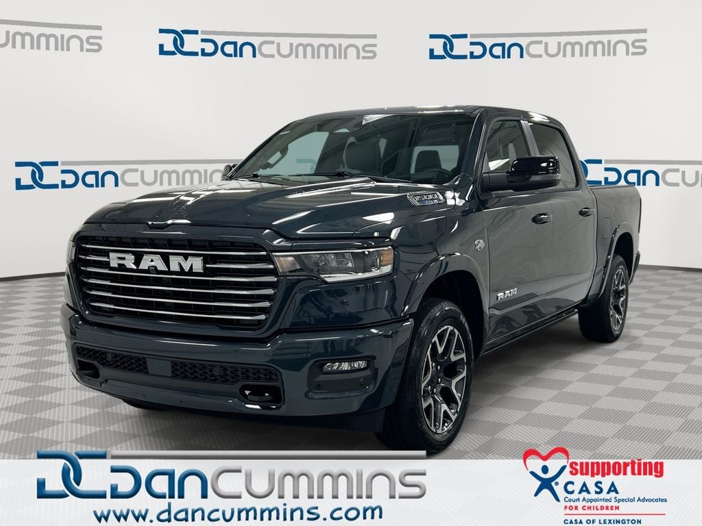 2026 RAM 1500 Laramie in Forged Blue Metallic Exterior Paint — front three-quarter view
