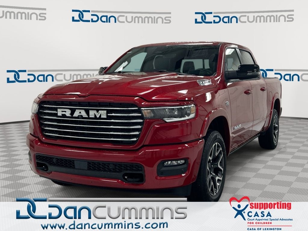 2026 RAM 1500 Laramie in Molten Red Pearl-Coat Exterior Paint — front three-quarter view