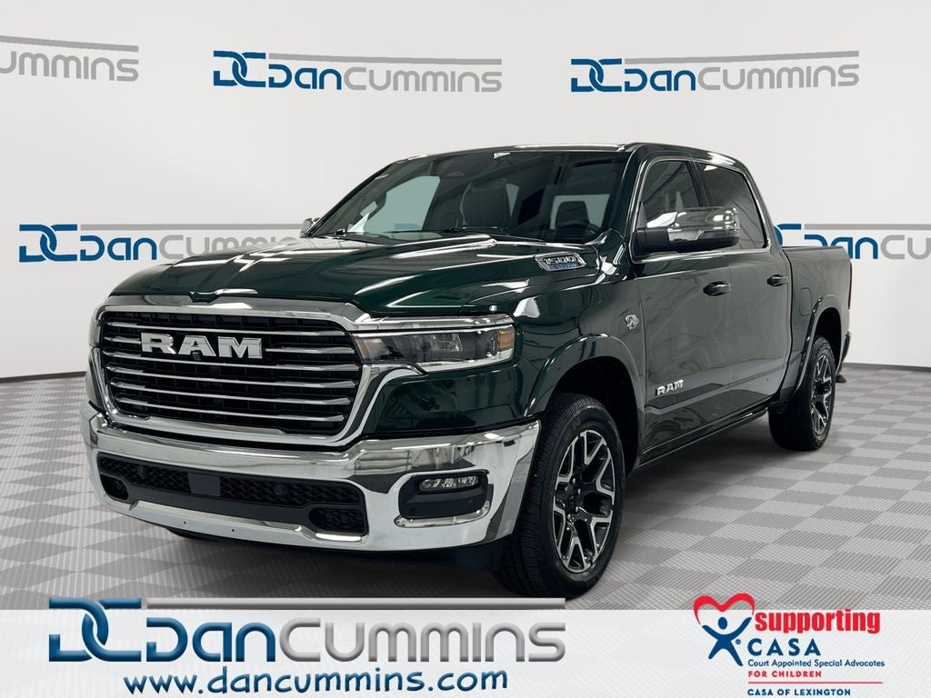 2026 RAM 1500 Laramie in Serrano-Green Metallic Exterior Paint — front three-quarter view