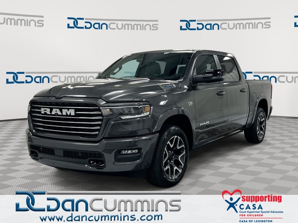 2026 RAM 1500 Laramie in Granite Crystal Metallic Clear-Coat Exterior Paint — front three-quarter view