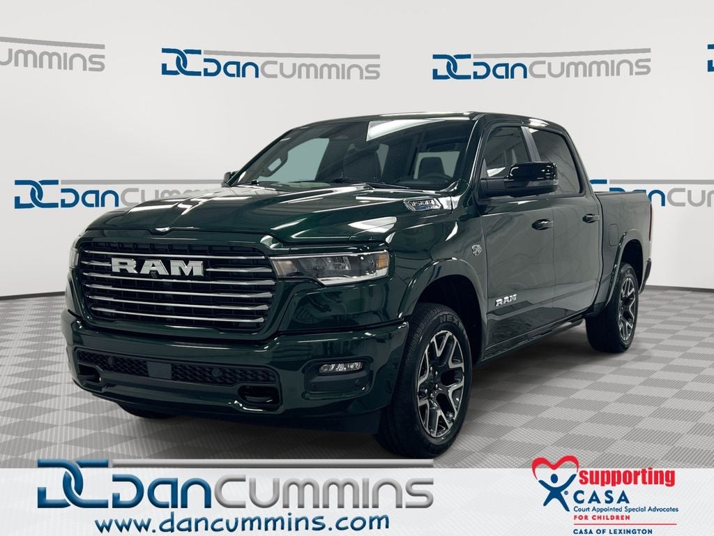 2026 RAM 1500 Laramie in Serrano-Green Metallic Exterior Paint — front three-quarter view