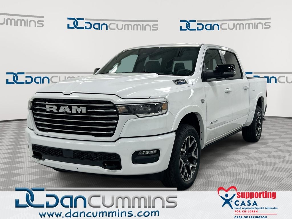 2026 RAM 1500 Laramie in Bright White Clear-Coat Exterior Paint — front three-quarter view