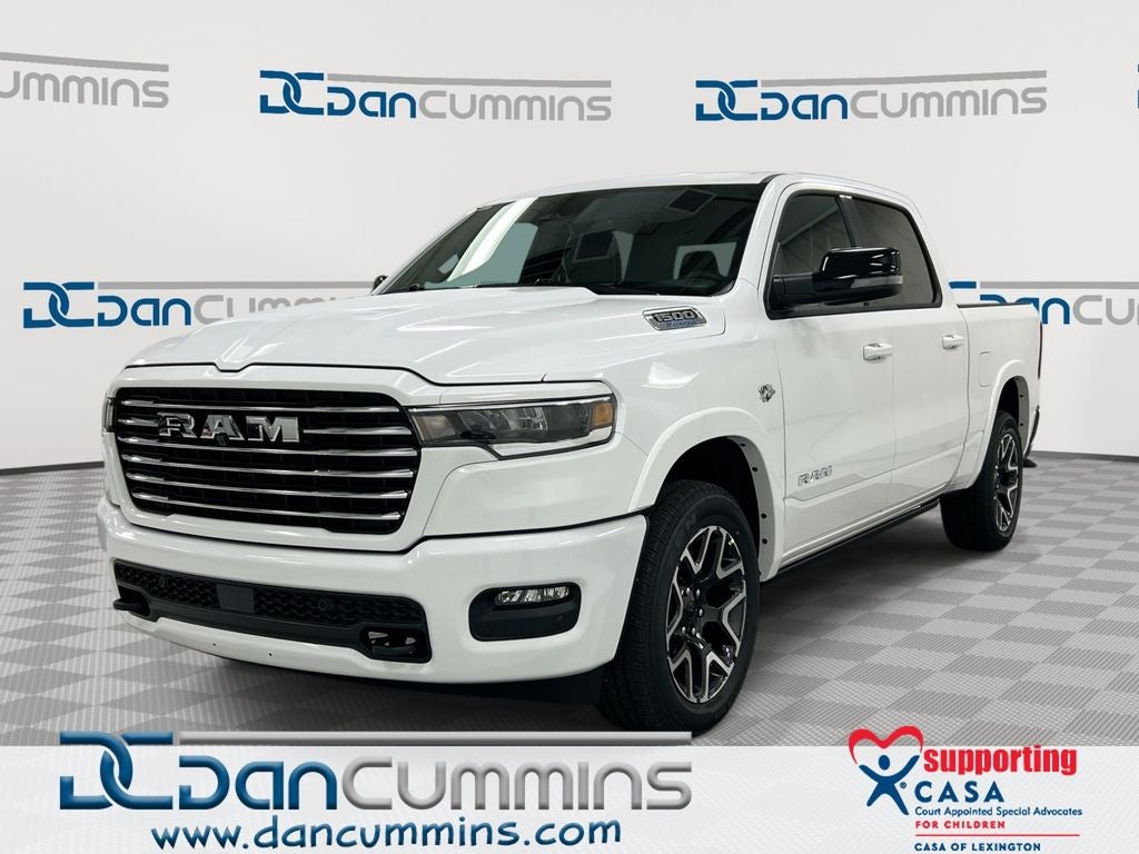 2026 RAM 1500 Laramie in Bright White Clear-Coat Exterior Paint — front three-quarter view