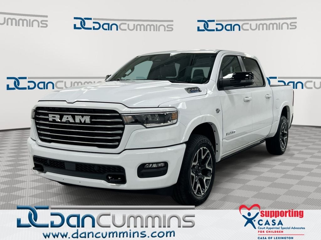 2026 RAM 1500 Laramie in Bright White Clear-Coat Exterior Paint — front three-quarter view