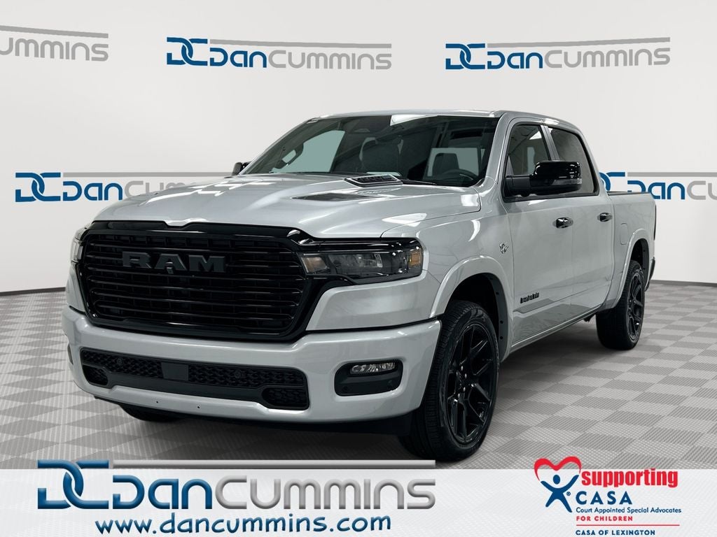 2026 RAM 1500 Laramie in Silver Zynith Exterior Paint — front three-quarter view