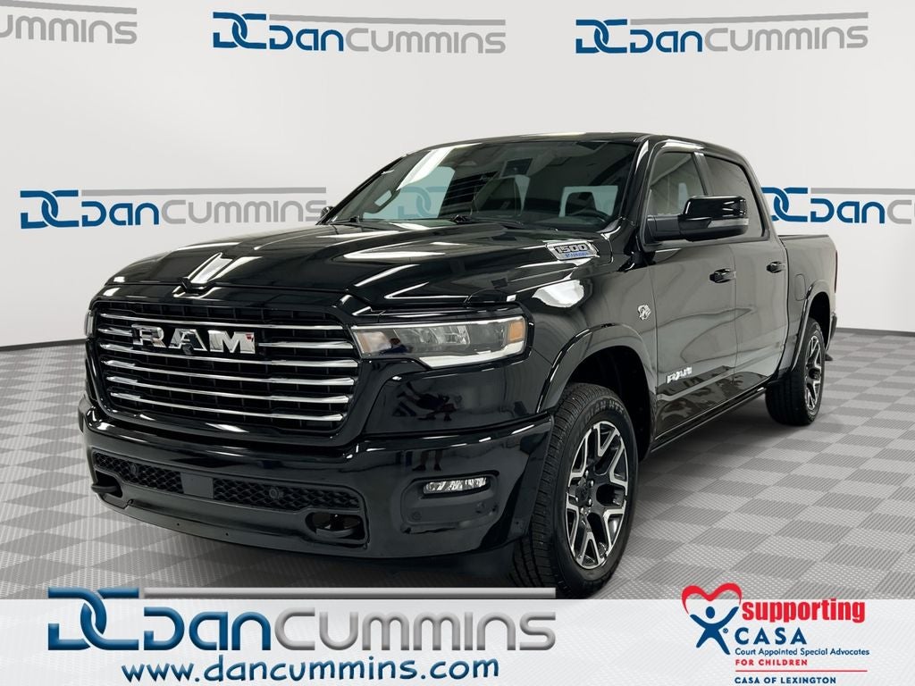2026 RAM 1500 Laramie in Diamond Black Crystal Pearl-Coat Exterior Paint — front three-quarter view