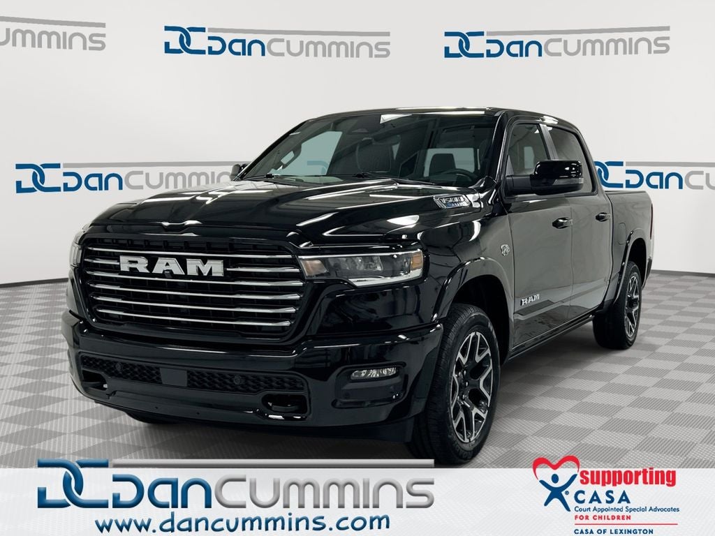 2026 RAM 1500 Laramie in Diamond Black Crystal Pearl-Coat Exterior Paint — front three-quarter view