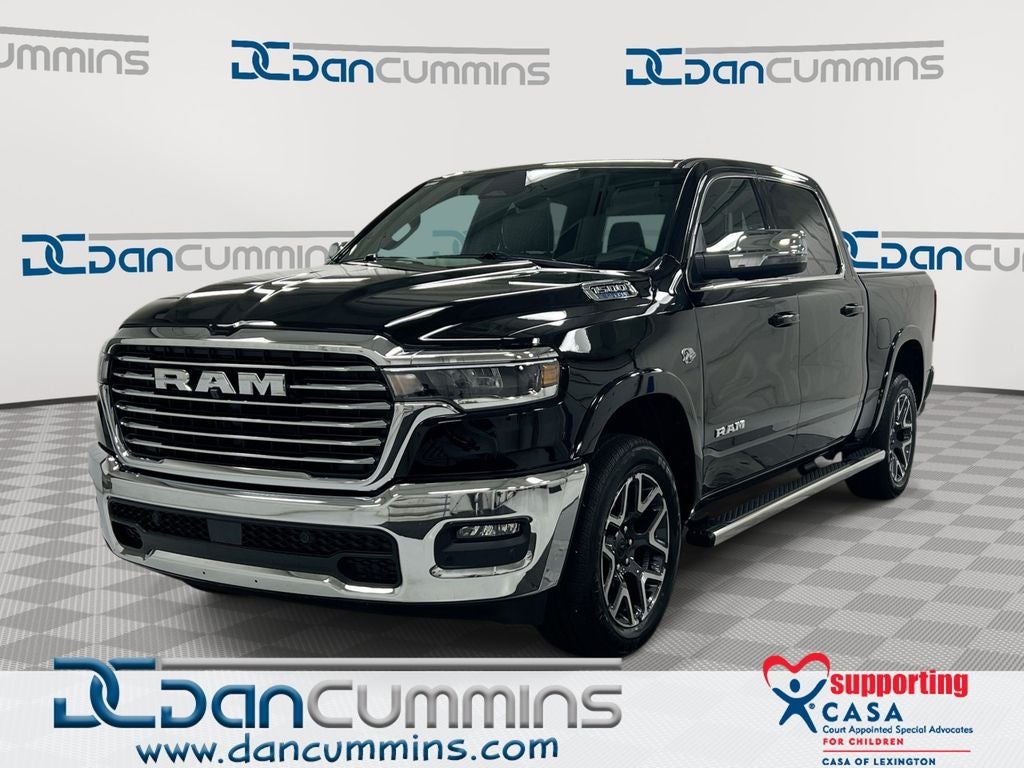 2026 RAM 1500 Laramie in Diamond Black Crystal Pearl-Coat Exterior Paint — front three-quarter view