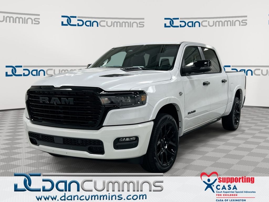 2026 RAM 1500 Laramie in Ivory White Tri-Coat Pearl-Coat Exterior Paint — front three-quarter view