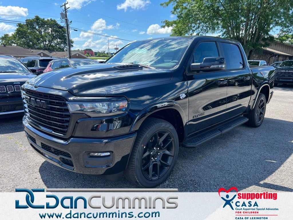 2026 RAM 1500 Laramie in Diamond Black Crystal Pearl-Coat Exterior Paint — front three-quarter view