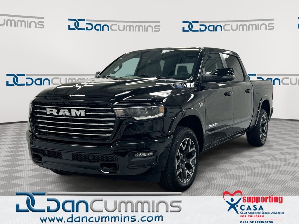 2026 RAM 1500 Laramie in Diamond Black Crystal Pearl-Coat Exterior Paint — front three-quarter view