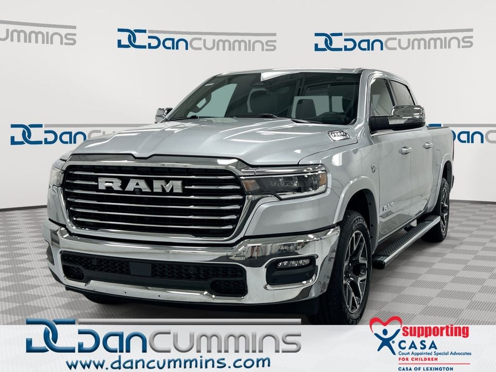 2026 RAM 1500 Laramie in Silver Zynith Exterior Paint — front three-quarter view