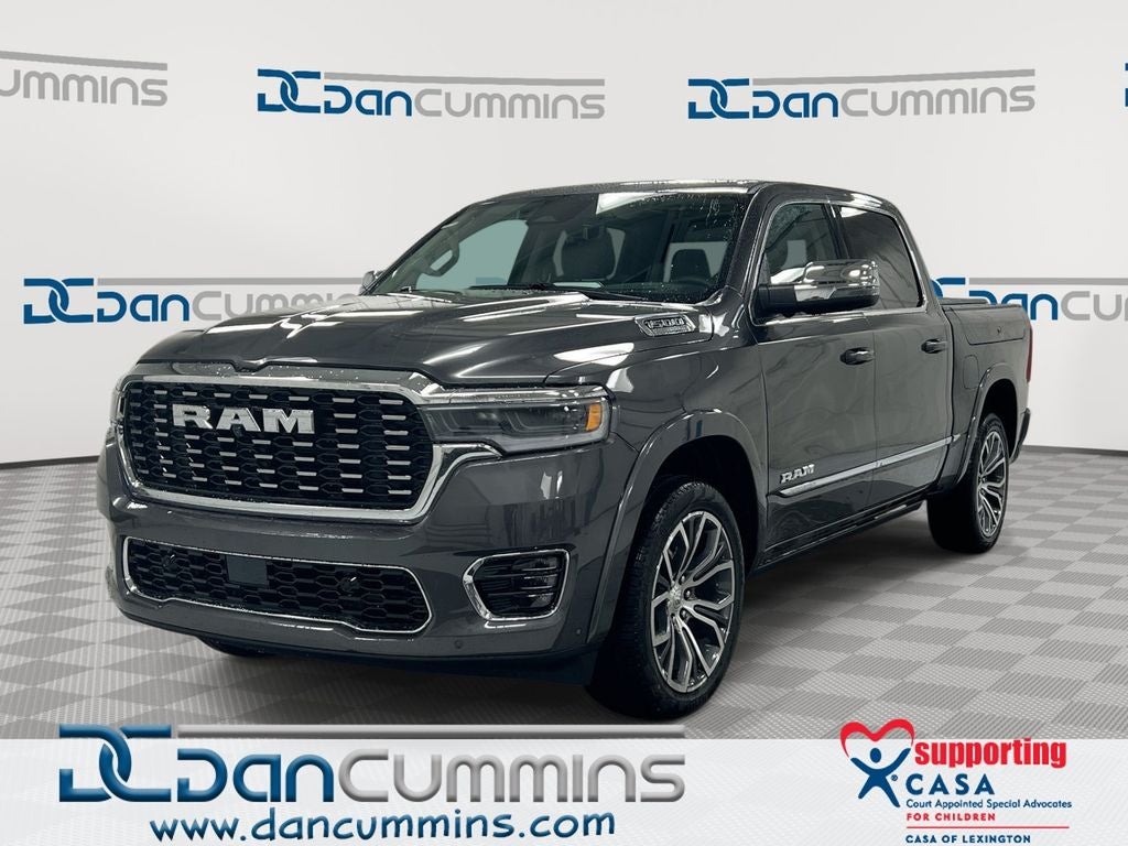 2026 RAM 1500 Tungsten in Granite Crystal Metallic Clear-Coat Exterior Paint — front three-quarter view