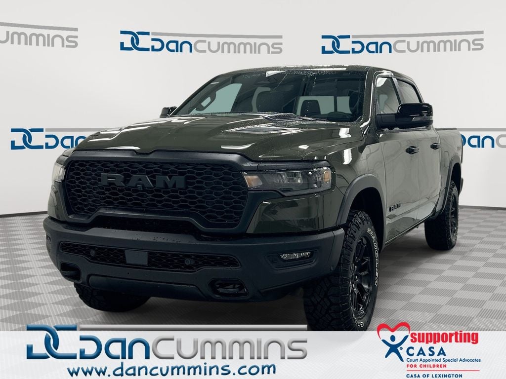2026 RAM 1500 Rebel in Tank Exterior Paint — front three-quarter view