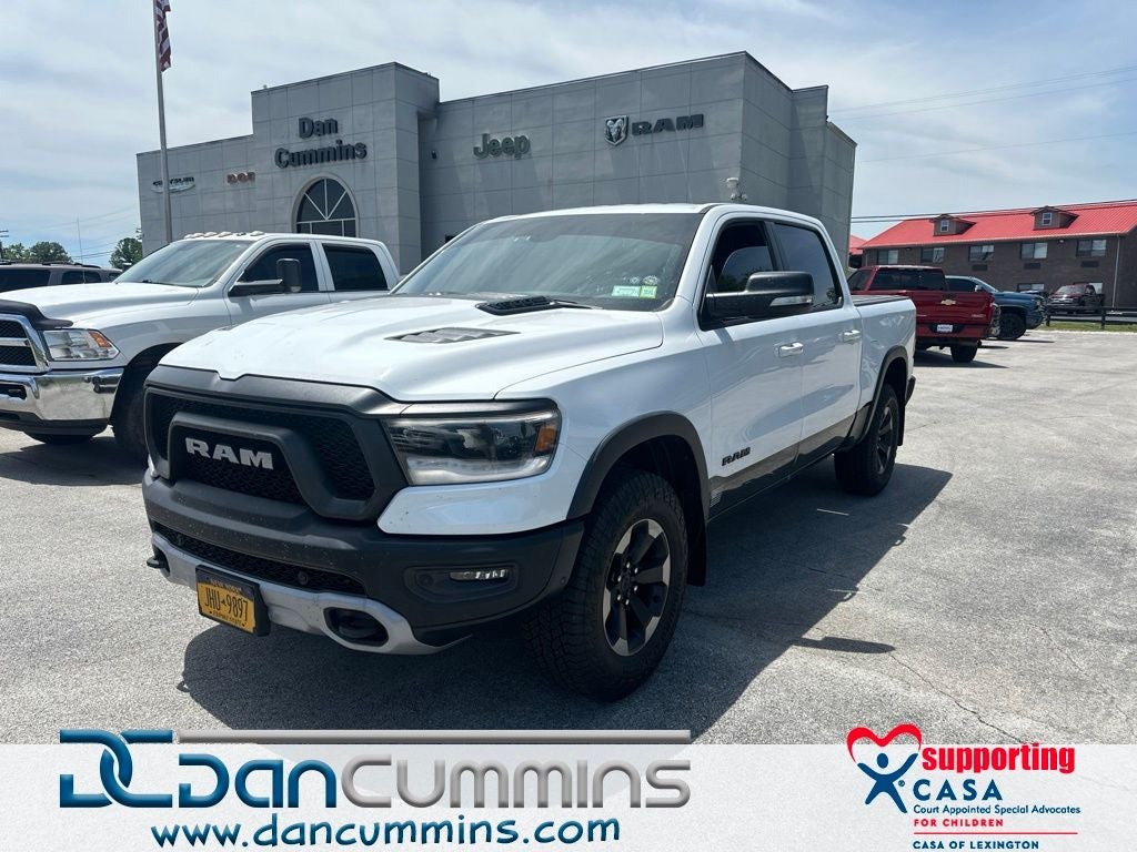 2019 RAM 1500 Rebel in Bright White Clearcoat — front three-quarter view