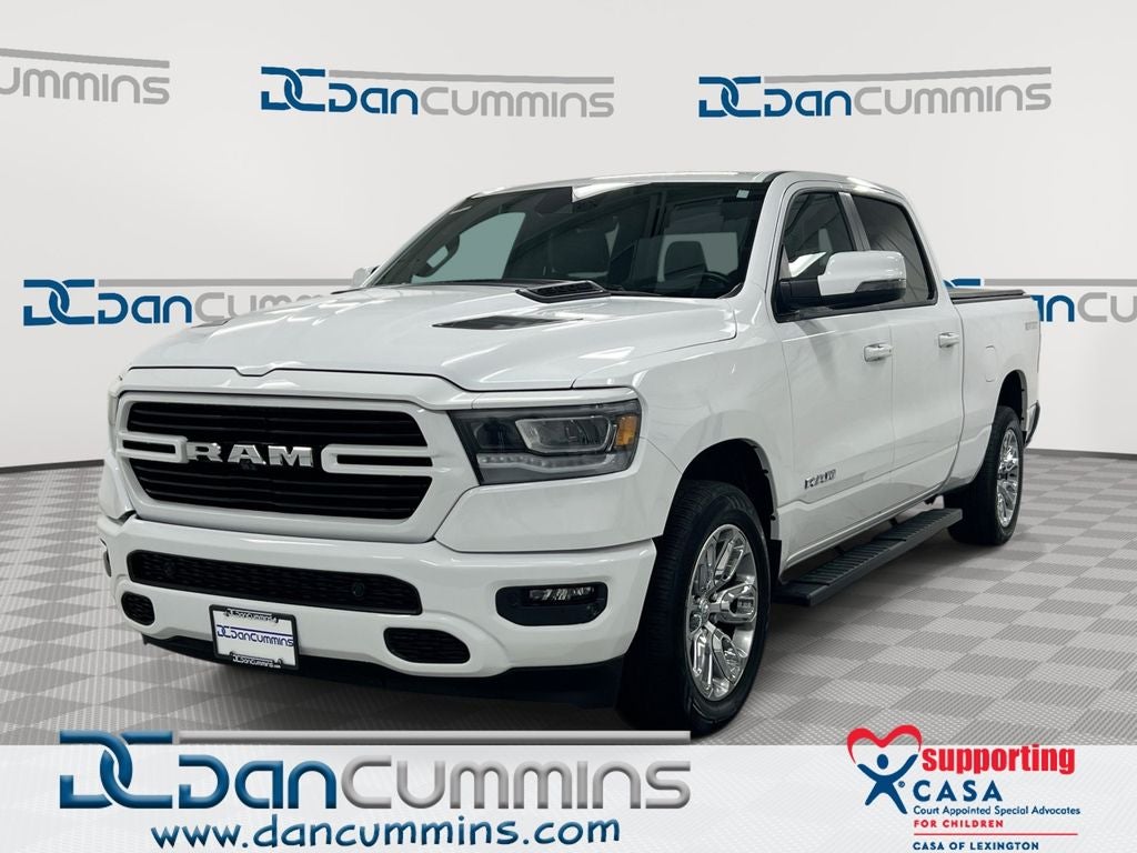 2023 RAM 1500 Laramie in Bright White Clearcoat — front three-quarter view