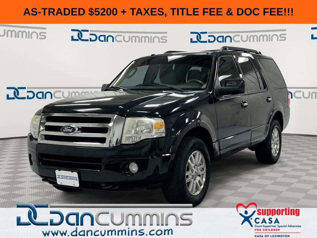 2014 Ford Expedition XLT in Tuxedo Black Metallic — front three-quarter view