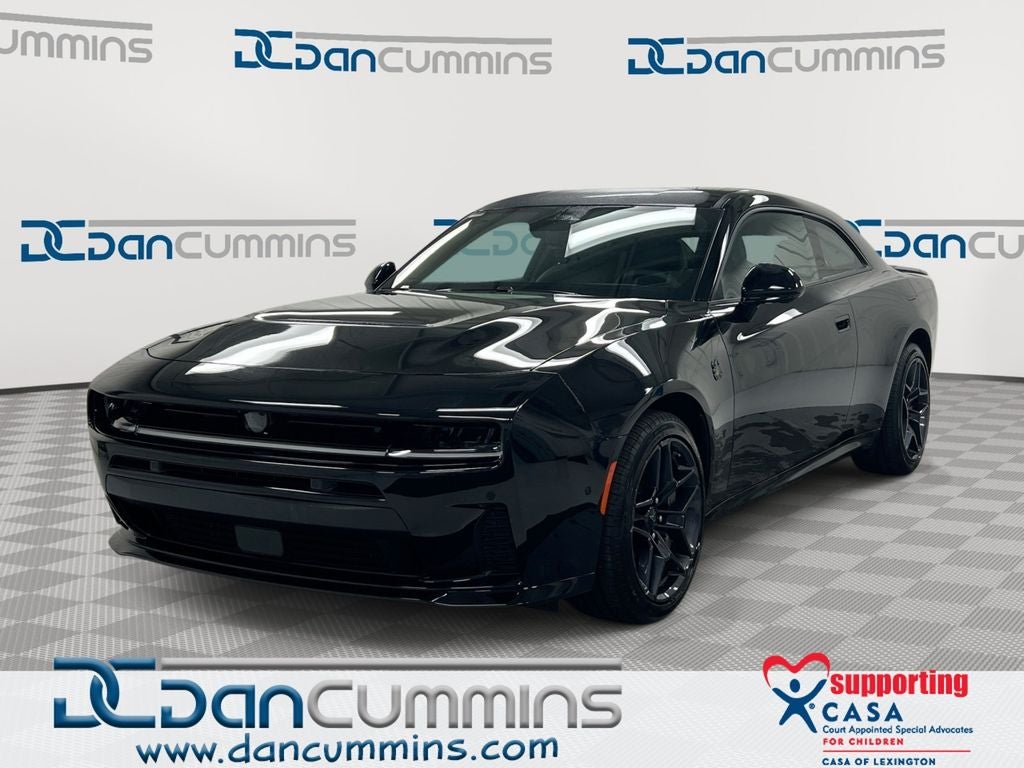 2026 Dodge Charger Scat Pack Plus in Diamond Black Crystal Pearlcoat — front three-quarter view
