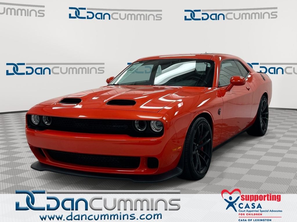 2023 Dodge Challenger SRT Hellcat Jailbreak in Go Mango — front three-quarter view