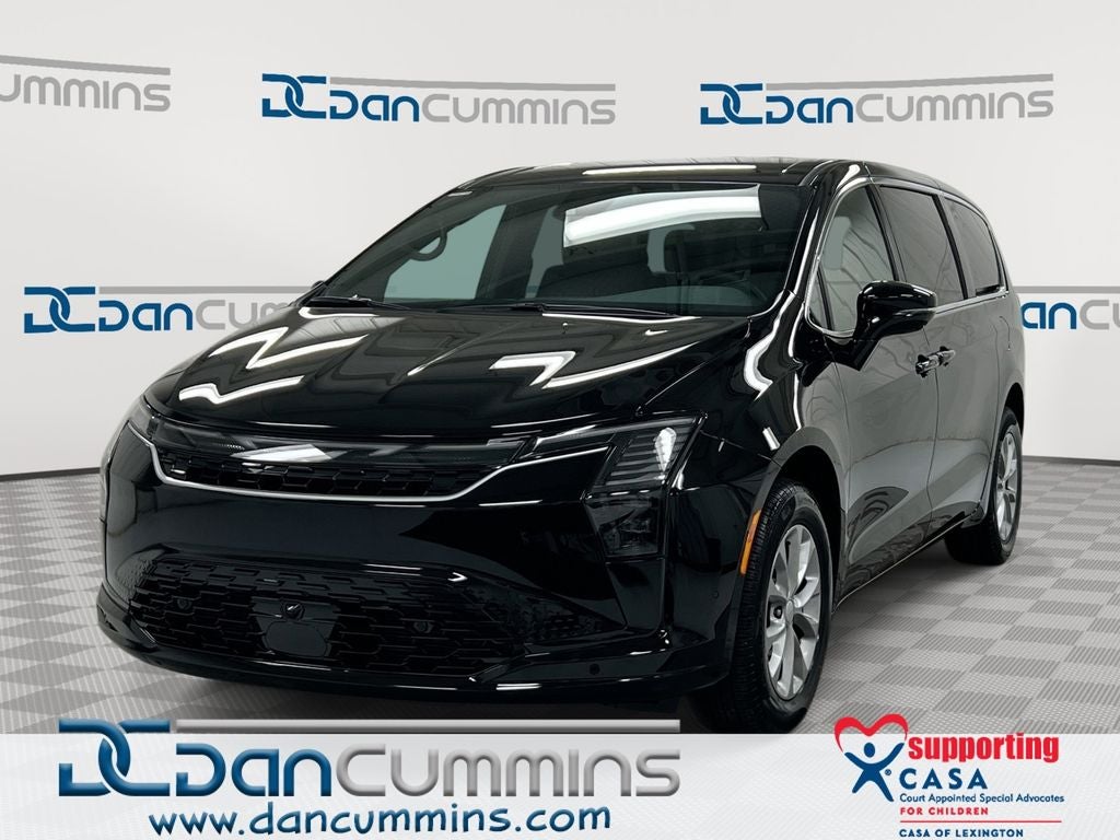 2027 Chrysler Pacifica Select in Diamond Black Crystal Pearl-Coat Exterior Paint — front three-quarter view