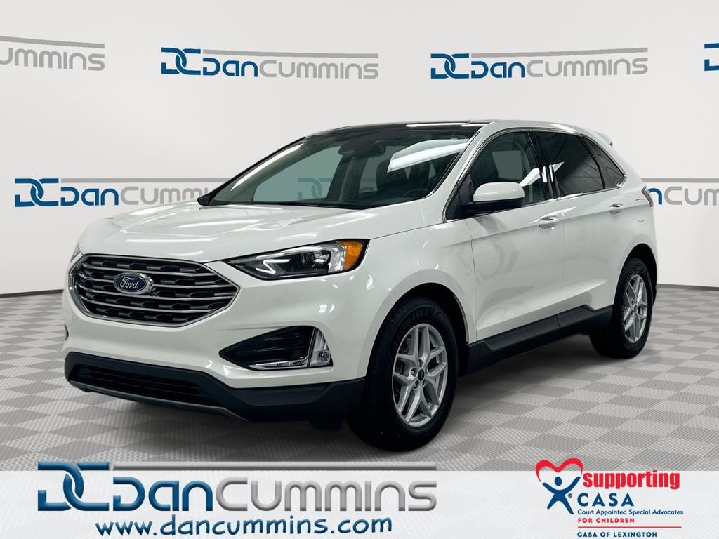 2022 Ford Edge SEL in Star White Metallic Tri-Coat — front three-quarter view