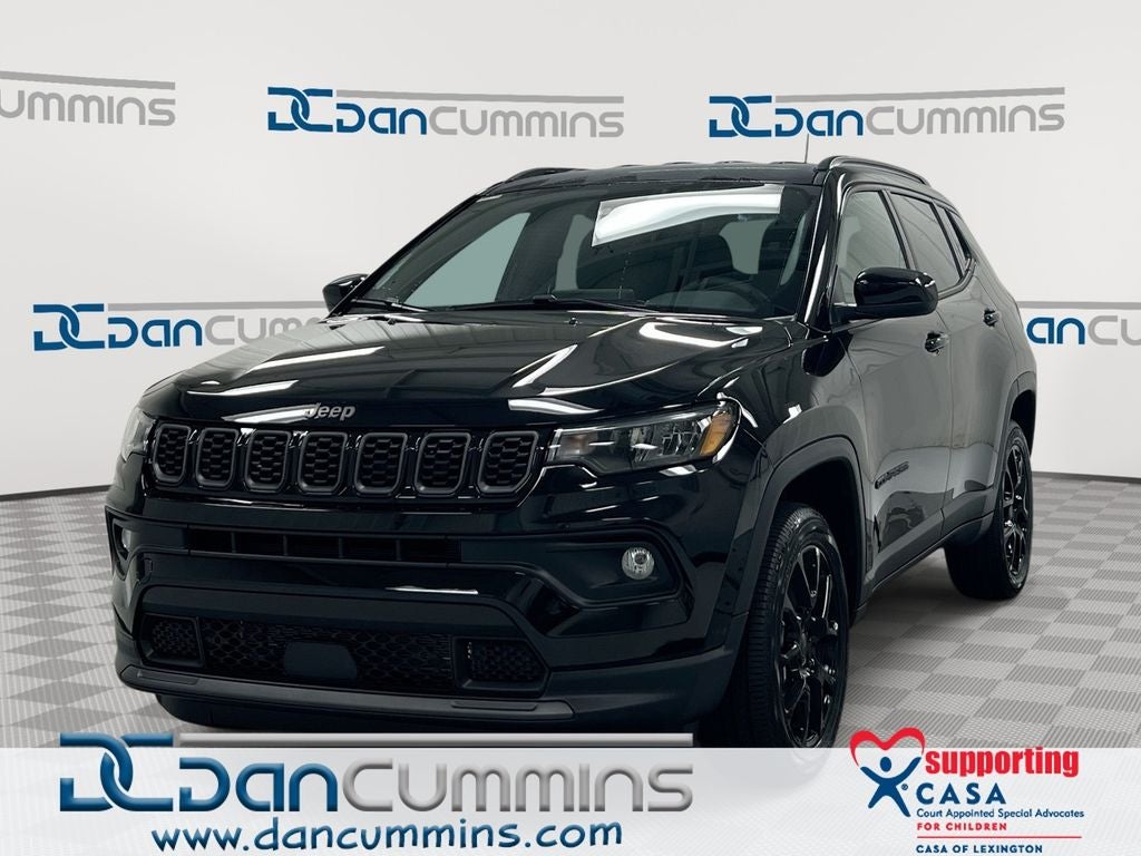 2026 Jeep Compass Latitude in Diamond Black Crystal Pearl-Coat Exterior Paint — front three-quarter view