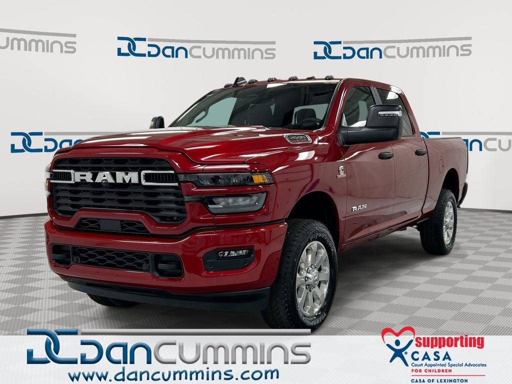 2026 RAM 2500 Big Horn in Molten Red Pearl-Coat Exterior Paint — front three-quarter view