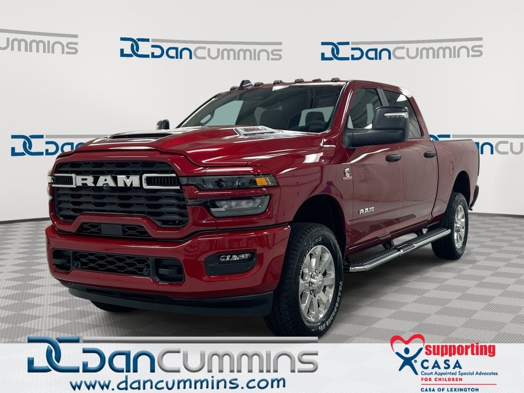 2026 RAM 2500 Big Horn in Molten Red Pearl-Coat Exterior Paint — front three-quarter view