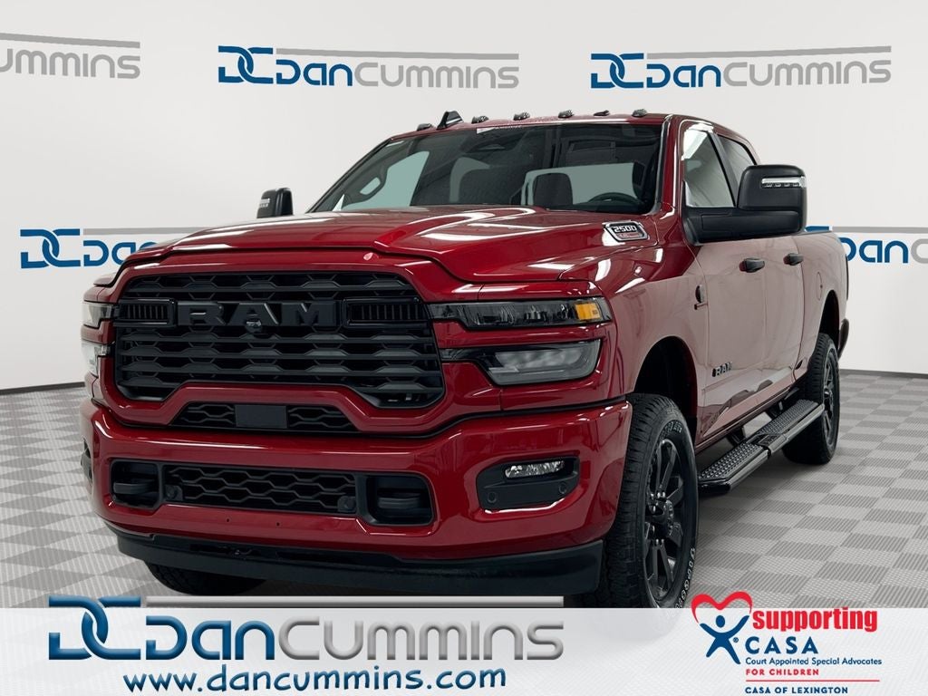 2026 RAM 2500 Big Horn in Molten Red Pearl-Coat Exterior Paint — front three-quarter view